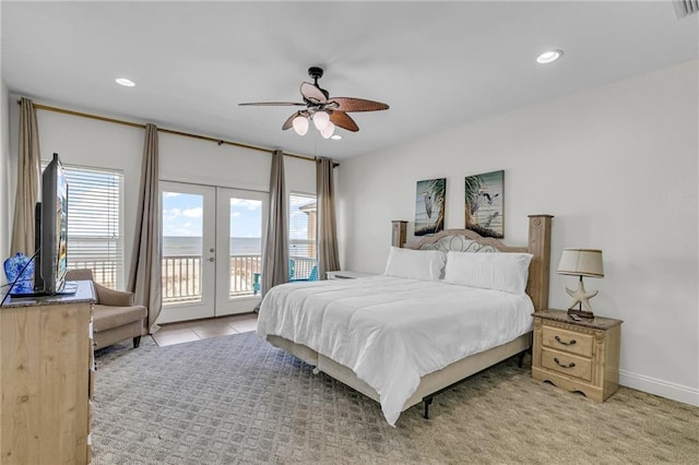 1385 Beach Blvd W, Gulf Shores, AL 36542 - bedroom featuring light carpet, ceiling fan, french doors, and access to exterior