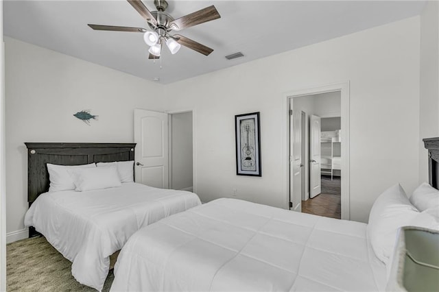 1385 Beach Blvd W, Gulf Shores, AL 36542 - bedroom featuring ceiling fan and light colored carpet