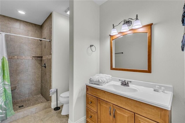 1385 Beach Blvd W, Gulf Shores, AL 36542 - bathroom featuring a shower with shower curtain, tile flooring, vanity, and toilet