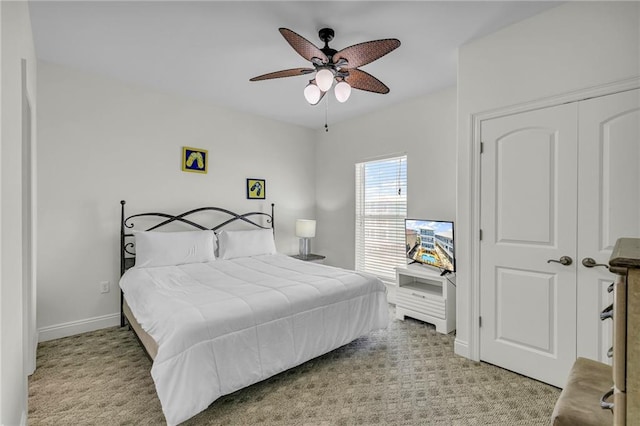 1385 Beach Blvd W, Gulf Shores, AL 36542 - carpeted bedroom with ceiling fan and a closet