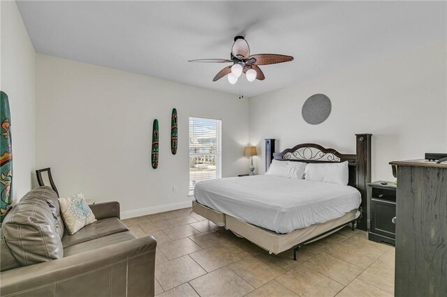 1385 Beach Blvd W, Gulf Shores, AL 36542 - tiled bedroom featuring ceiling fan