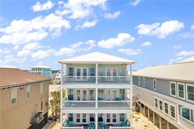 1385 Beach Blvd W, Gulf Shores, AL 36542 - back of house with central AC unit and a balcony