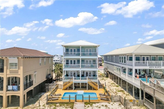 1385 Beach Blvd W, Gulf Shores, AL 36542 - rear view of property featuring a balcony