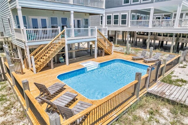 1385 Beach Blvd W, Gulf Shores, AL 36542 - view of swimming pool featuring a wooden deck