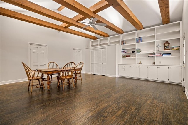 dining room featuring dark hardwood / wood-style floors, beam ceiling, and ceiling fan