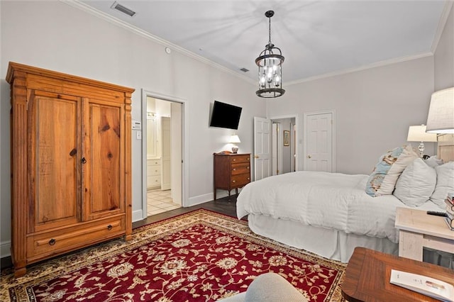 bedroom with hardwood / wood-style floors, crown molding, and a chandelier