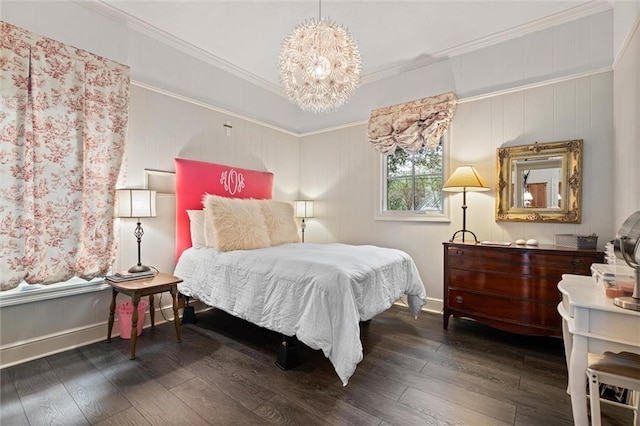 bedroom featuring a chandelier, crown molding, and dark wood-type flooring