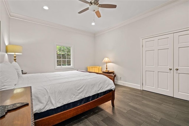 bedroom featuring ceiling fan, dark hardwood / wood-style floors, and ornamental molding