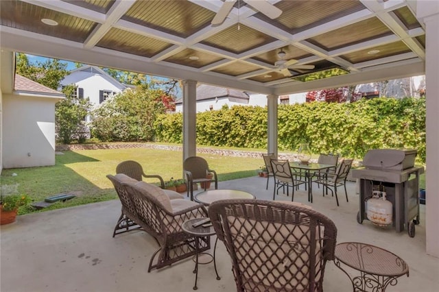 view of patio featuring ceiling fan and grilling area