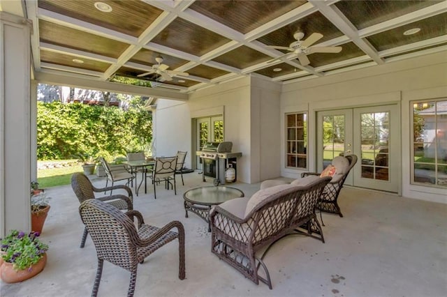 view of patio with french doors, an outdoor living space, ceiling fan, and grilling area