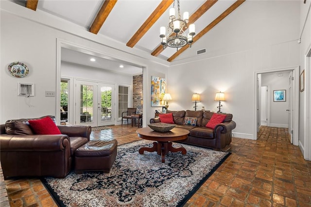 living room featuring a chandelier, beam ceiling, high vaulted ceiling, and french doors