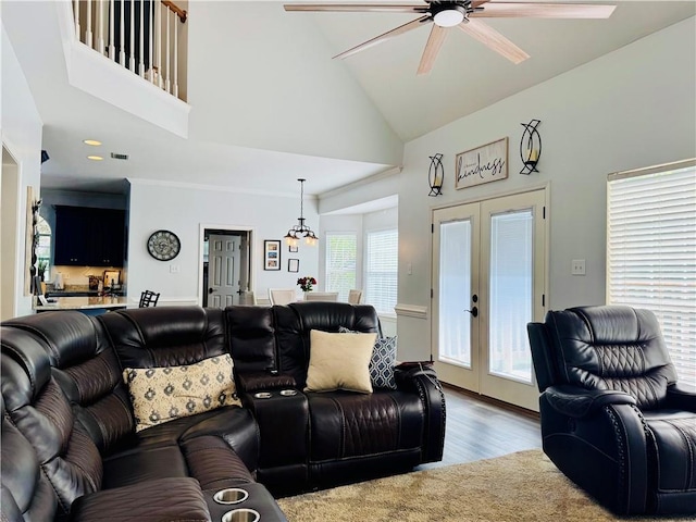 2200 Orourke Dr, Mobile, AL 36695 - living room featuring french doors, a ceiling fan, wood finished floors, and high vaulted ceiling