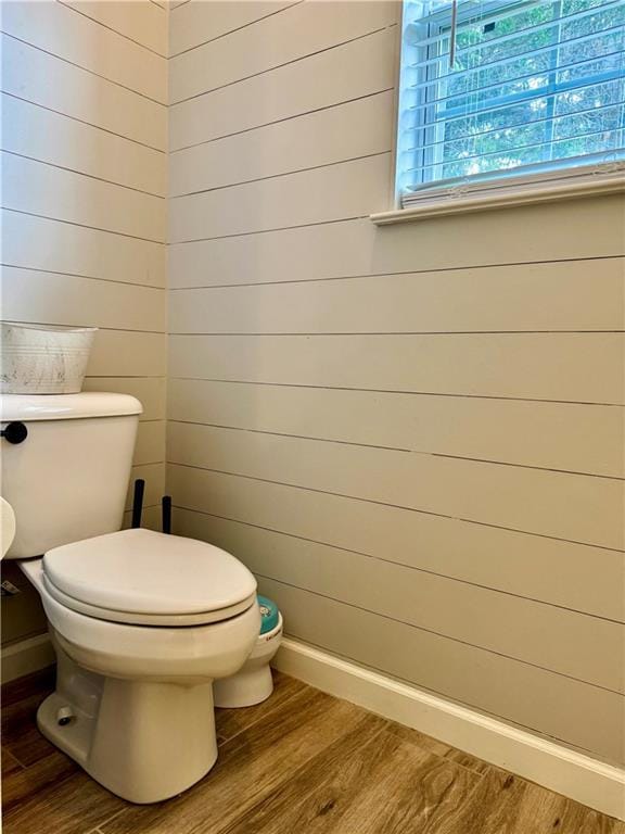 2200 Orourke Dr, Mobile, AL 36695 - bathroom with wood finished floors, toilet, and baseboards