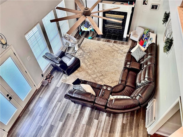 2200 Orourke Dr, Mobile, AL 36695 - living area with wood finished floors, healthy amount of natural light, ceiling fan, and a premium fireplace