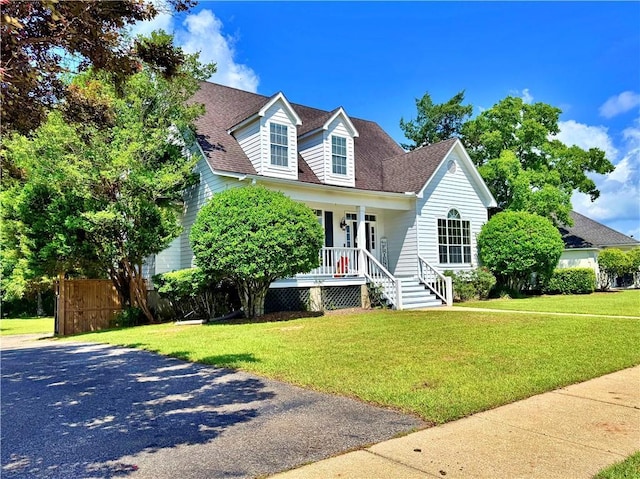 2200 Orourke Dr, Mobile, AL 36695 - new england style home with covered porch and a shingled roof