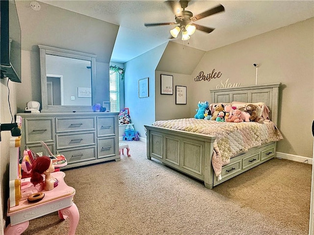 2200 Orourke Dr, Mobile, AL 36695 - bedroom featuring light carpet, baseboards, lofted ceiling, and a ceiling fan