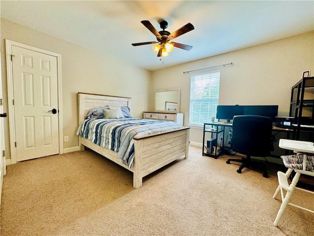 2200 Orourke Dr, Mobile, AL 36695 - bedroom with carpet floors, a desk, a ceiling fan, and baseboards