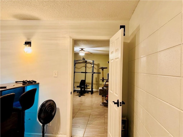 2200 Orourke Dr, Mobile, AL 36695 - corridor with a textured ceiling, an office area, and light tile patterned flooring