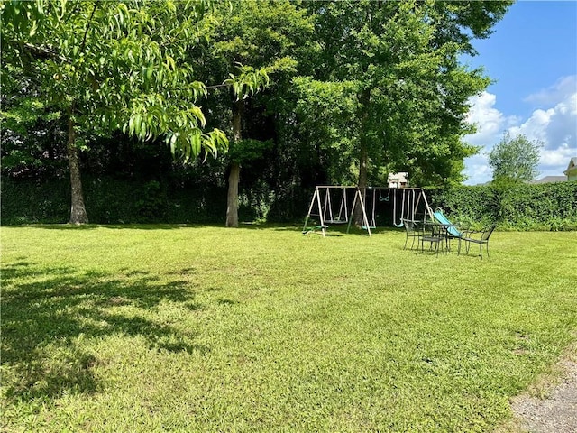 2200 Orourke Dr, Mobile, AL 36695 - view of green lawn with a playground