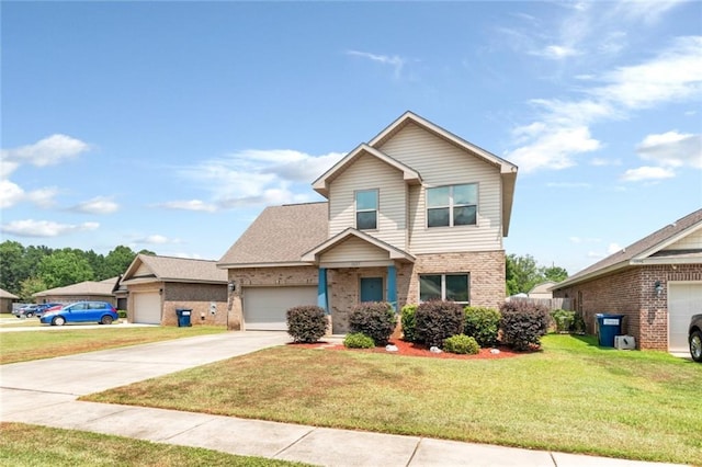 view of front of house with a front yard and a garage