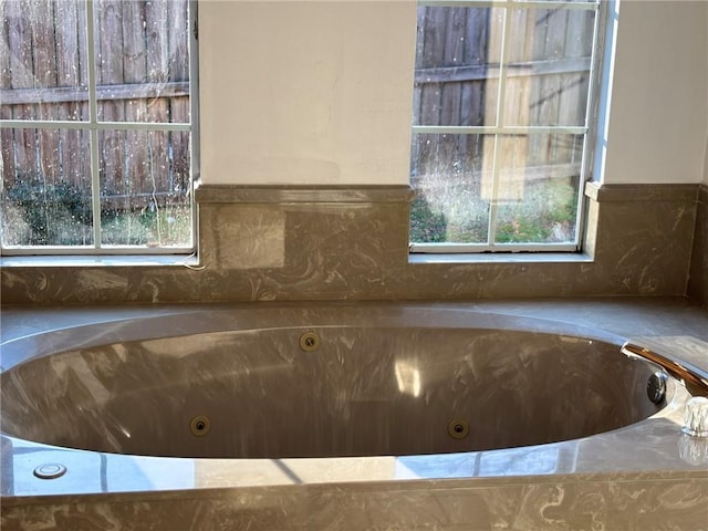 bathroom featuring a whirlpool tub