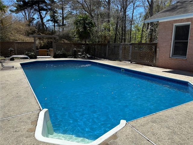 view of pool with fence and a fenced in pool