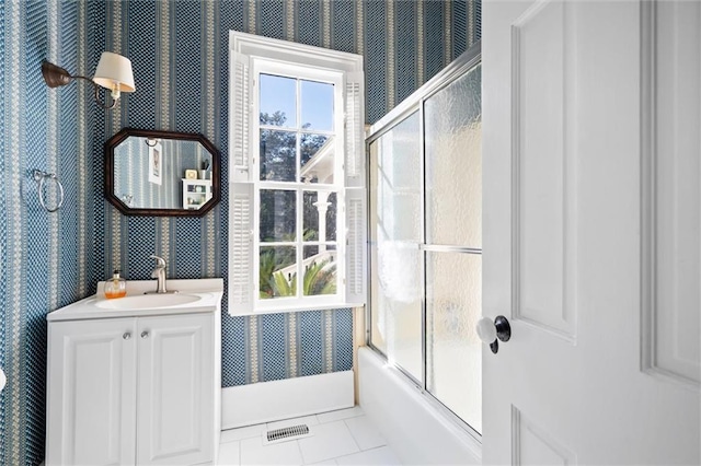 26 Julia St S, Mobile, AL 36604 - full bathroom featuring wallpapered walls, vanity, combined bath / shower with glass door, and tile patterned flooring