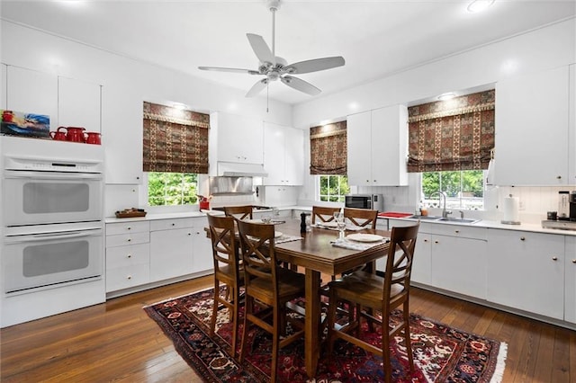 26 Julia St S, Mobile, AL 36604 - dining room featuring dark wood finished floors and ceiling fan