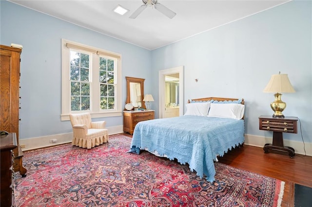 26 Julia St S, Mobile, AL 36604 - bedroom featuring wood finished floors, baseboards, and a ceiling fan
