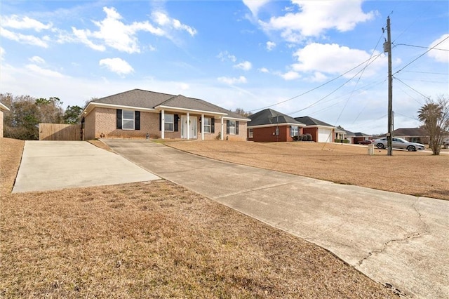 ranch-style house with a front yard