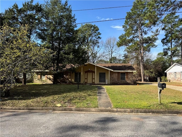 view of front of home with a front yard