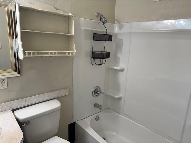 bathroom featuring  shower combination and toilet