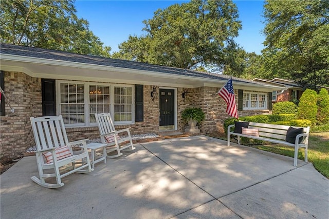 exterior space featuring covered porch