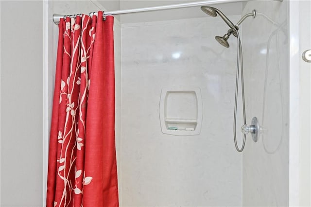 bathroom featuring a shower with curtain