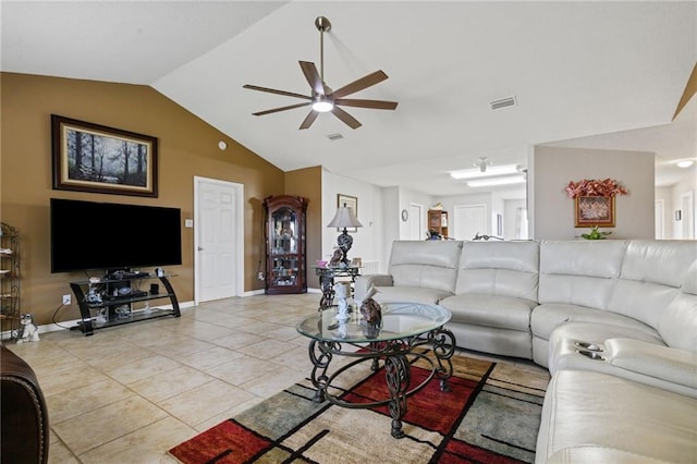 living room featuring vaulted ceiling, light tile patterned floors, visible vents, and a ceiling fan