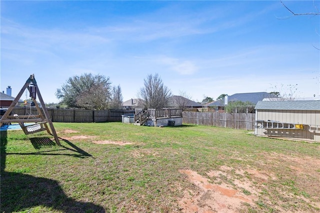 view of yard featuring a fenced backyard