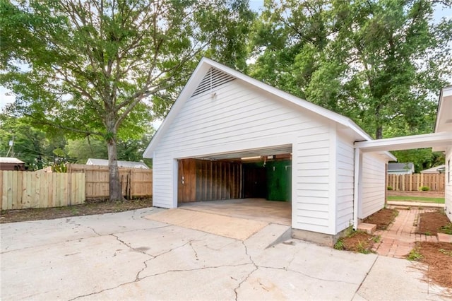 detached garage with fence