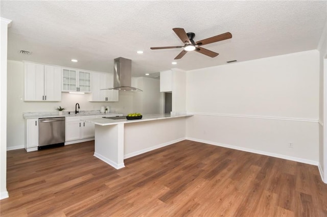 kitchen featuring extractor fan, dishwasher, a ceiling fan, white cabinets, and a textured ceiling