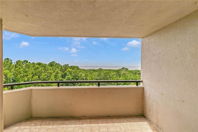 100 Tower Dr Unit 704, Daphne, AL 36526 - balcony featuring a forest view