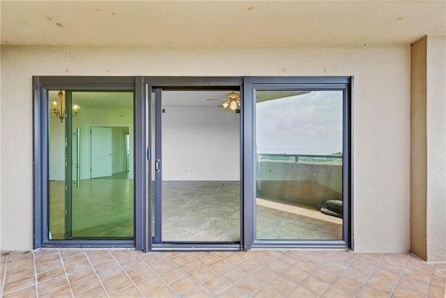 100 Tower Dr Unit 704, Daphne, AL 36526 - view of exterior entry with stucco siding