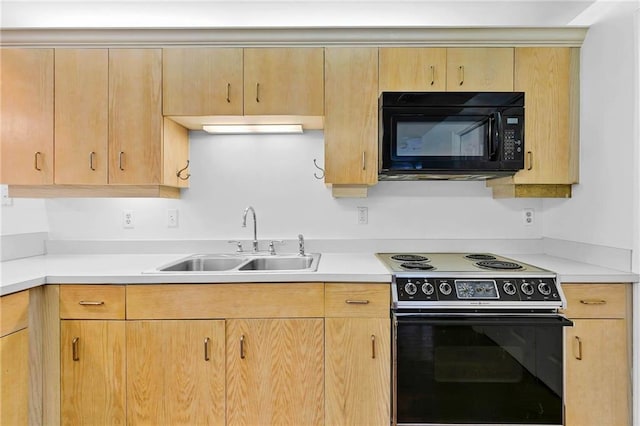 100 Tower Dr Unit 704, Daphne, AL 36526 - kitchen with black microwave, electric range oven, light countertops, and light brown cabinetry