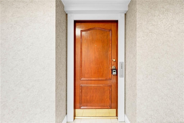 100 Tower Dr Unit 704, Daphne, AL 36526 - view of exterior entry with stucco siding