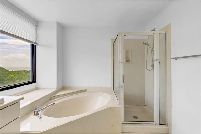 100 Tower Dr Unit 704, Daphne, AL 36526 - full bath featuring healthy amount of natural light, a shower stall, and a bath