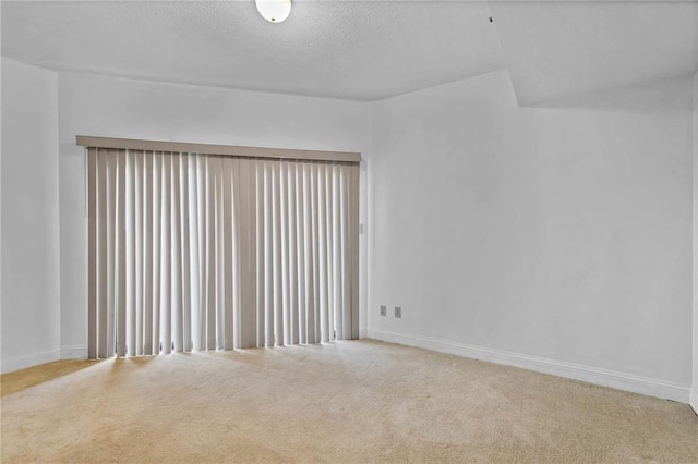 100 Tower Dr Unit 704, Daphne, AL 36526 - carpeted spare room with baseboards and a textured ceiling