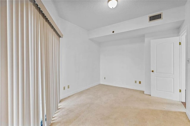 100 Tower Dr Unit 704, Daphne, AL 36526 - empty room with carpet flooring and a textured ceiling