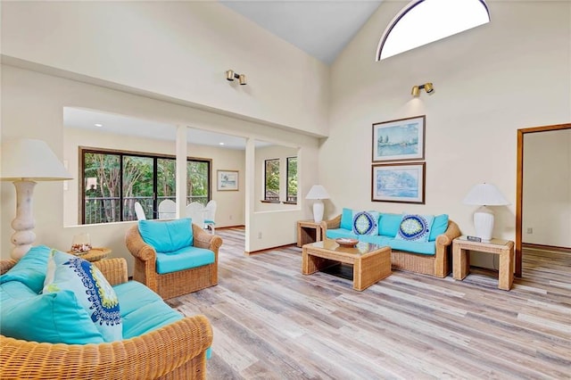100 Tower Dr Unit 704, Daphne, AL 36526 - living area featuring light wood-type flooring and high vaulted ceiling
