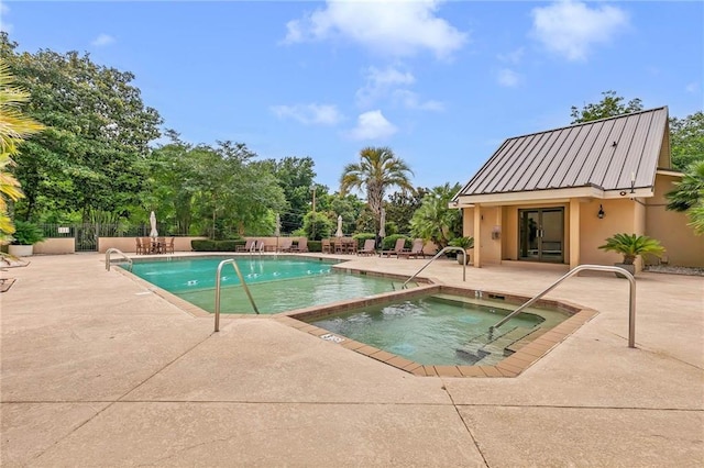 100 Tower Dr Unit 704, Daphne, AL 36526 - community pool featuring a patio area and a hot tub