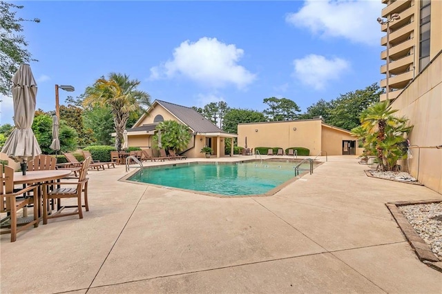 100 Tower Dr Unit 704, Daphne, AL 36526 - community pool with a patio area