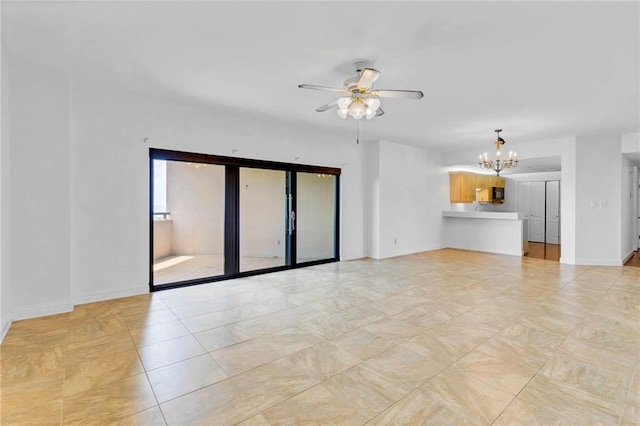100 Tower Dr Unit 704, Daphne, AL 36526 - unfurnished living room with a chandelier and a ceiling fan