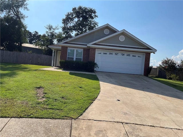 single story home with a garage and a front lawn